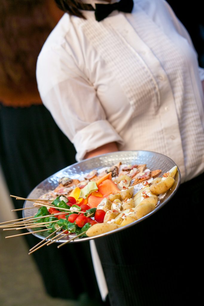 server with appetizers