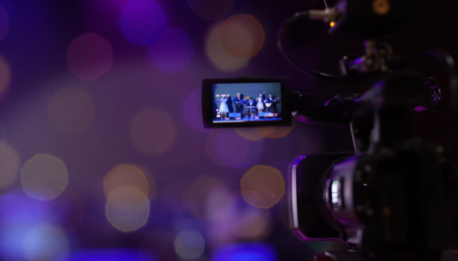 Soft and Blur focus camera show viewfinder image catch motion in interview or broadcast wedding ceremony, Video Cinema From camera. video cinema production on Bokeh background