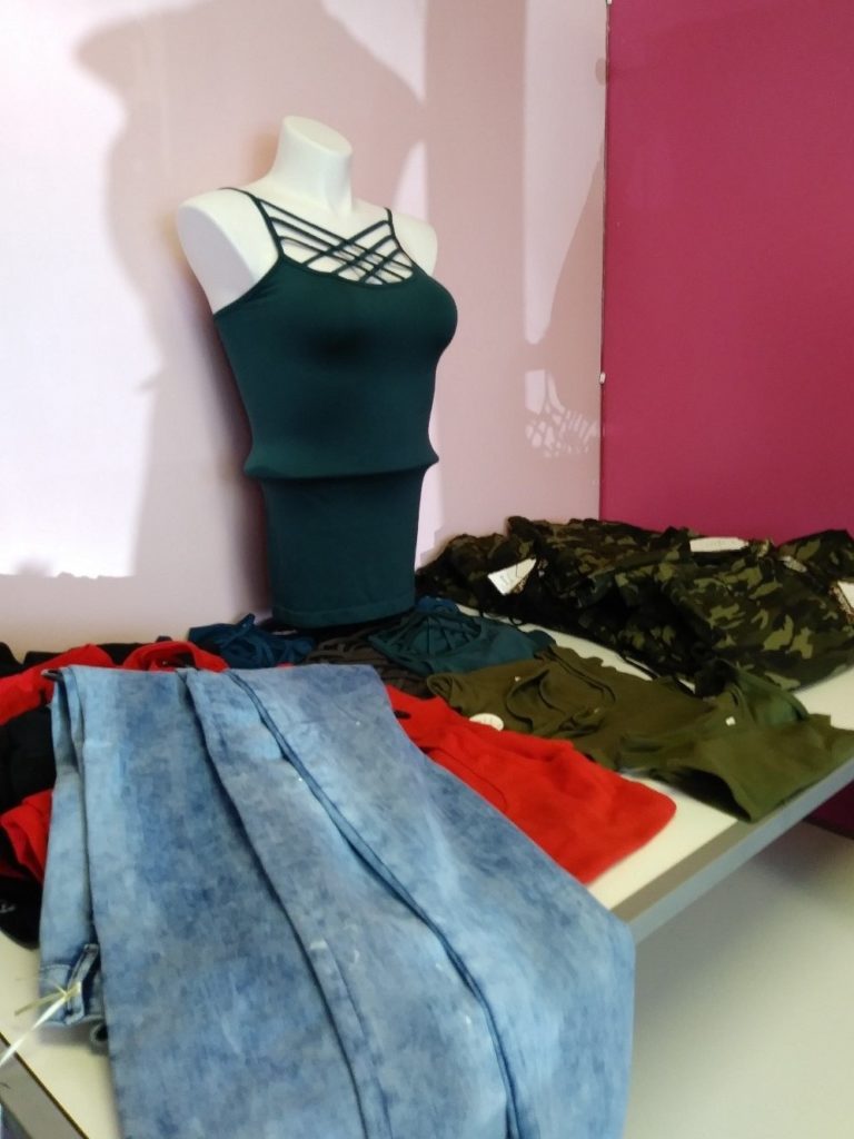 Clothing display at Roses R Red, Inc.