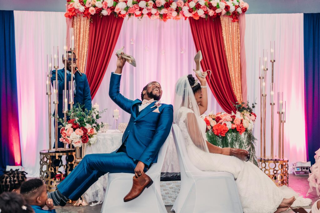 Photo by Joshua J Lewis: https://www.pexels.com/photo/a-bride-and-groom-are-sitting-on-a-chair-at-their-wedding-ceremony-27333361/